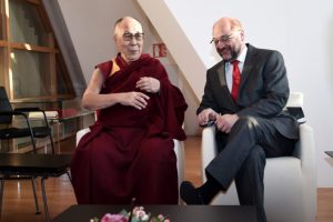 The Dalai Lama (L) is welcomed by European Parliament President Martin Schulz as part of his visit at the European Parliament in Strasbourg, eastern France, on September 15, 2016. / AFP / FREDERICK FLORIN (Photo credit should read FREDERICK FLORIN/AFP/Getty Images)