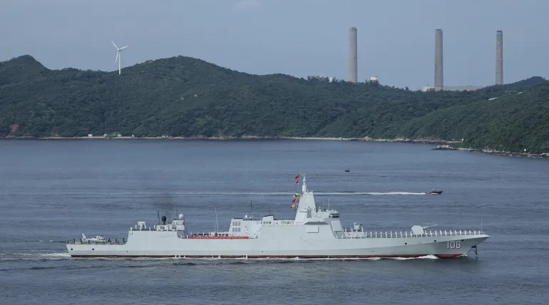 རྒྱ་ནག་གིས་ཨ་རིའི་རྒྱལ་སྲུང་ཚོང་ལས་ཁང་ཁག་གཅིག་ལ་སྲིད་དོན་ཉེས་ཆད་དང་ཐེ་ཝན་མཐའ་འཁོར་དུ་དམག་སྦྱོང་འགོ་འཛུགས།